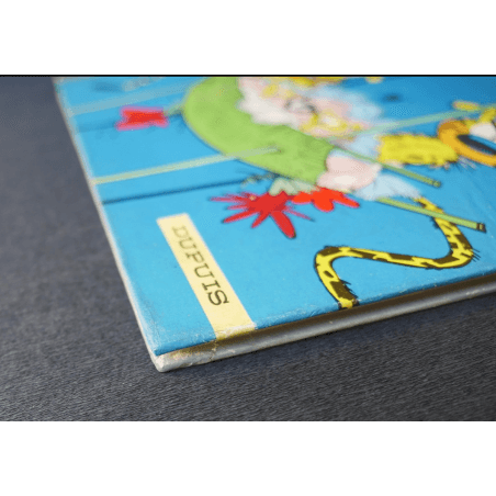 Spirou et Fantasio T.12 - Le Nid des Marsupilamis - C - EO - (1960)  Très bel exemplaireLes plats sont très beaux, très peu fro