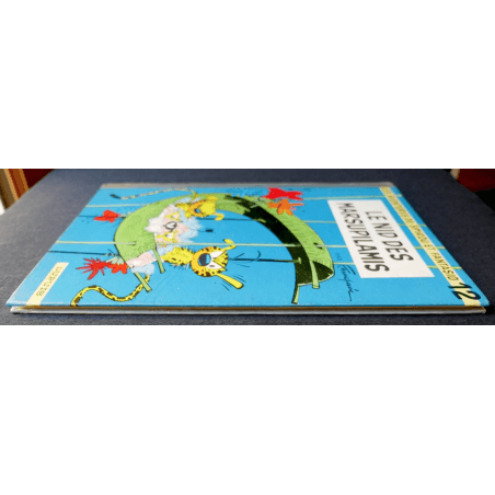 Spirou et Fantasio T.12 - Le Nid des Marsupilamis - C - EO - (1960)  Très bel exemplaireLes plats sont très beaux, très peu fro